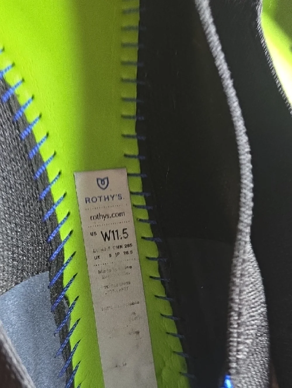 Rothy's Black Slip-On with Neon Green Insole and Blue Stitching Detail - Picture 3 of 3